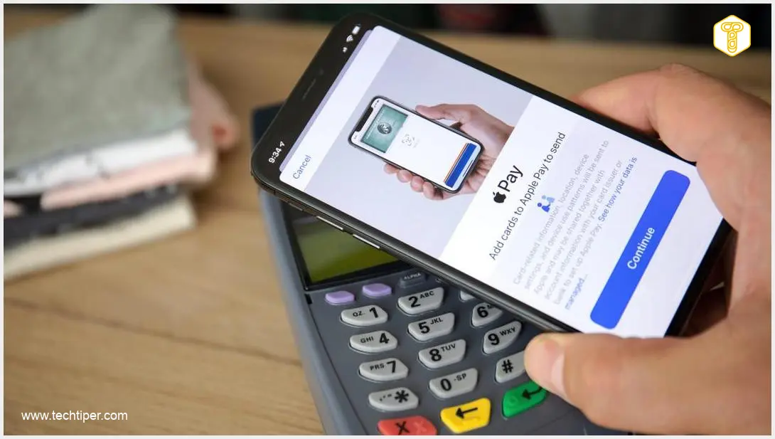 Image showing iPhone with Apple Pay screen displaying various credit and debit cards, with a focus on ease of switching between them.
