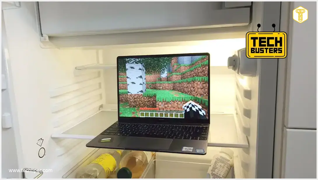 Image showing A high-angle shot of an open laptop placed inside a refrigerator, with subtle steam or cold mist emanating from it, and a game (like Minecraft) running on the screen, indicating an active test. The overall mood should be experimental and slightly whimsical, reflecting a "myth-busting" theme.